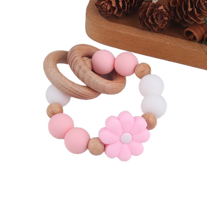 Nuevo juguete de mano para bebé con sonajero, los molares de los niños pueden morder el castaño de haya, margarita, pulsera de flores, mordedor