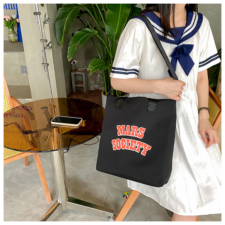 Canvas bag for women, single shoulder, ins crossbody, laid-back style, college student class bag, artistic Japanese style, large capacity, Hong Kong style, chic undefined