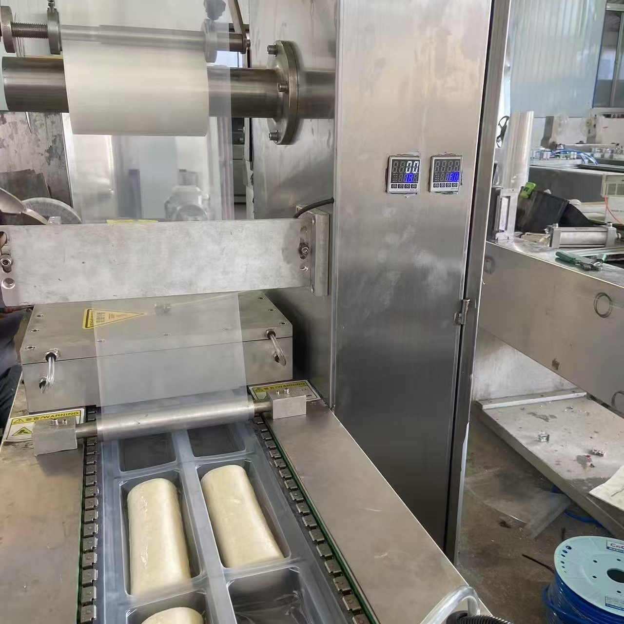 年糕二手拉伸膜真空包装机小型拉伸膜真空包装机酸菜真空包装设备