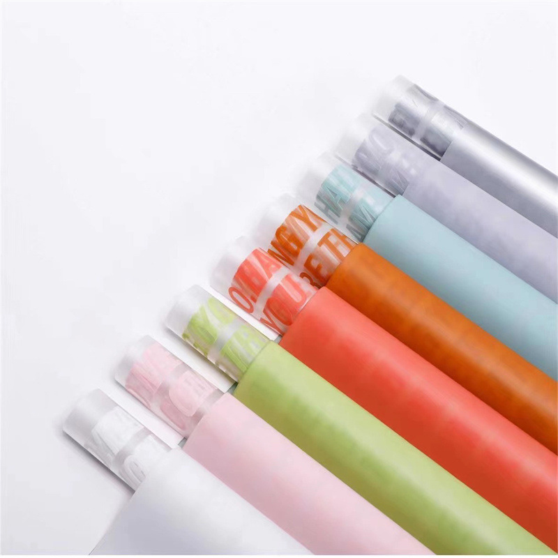 Flores de fábrica de fiestas al por mayor transfronterizos inglés impresión de niebla de papel de embalaje de flores impermeable florista paquete de papel