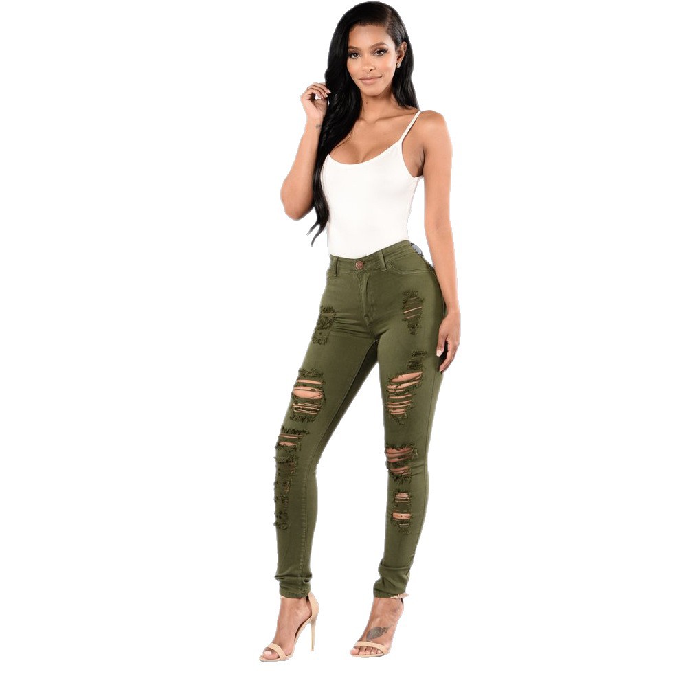 Los pantalones vaqueros rasgados de la rodilla europeos y americanos de las mujeres slim fit pantalones ajustados multicolores pantalones europeos de la estación pantalones de las mujeres más el tamaño de fábrica al por mayor
