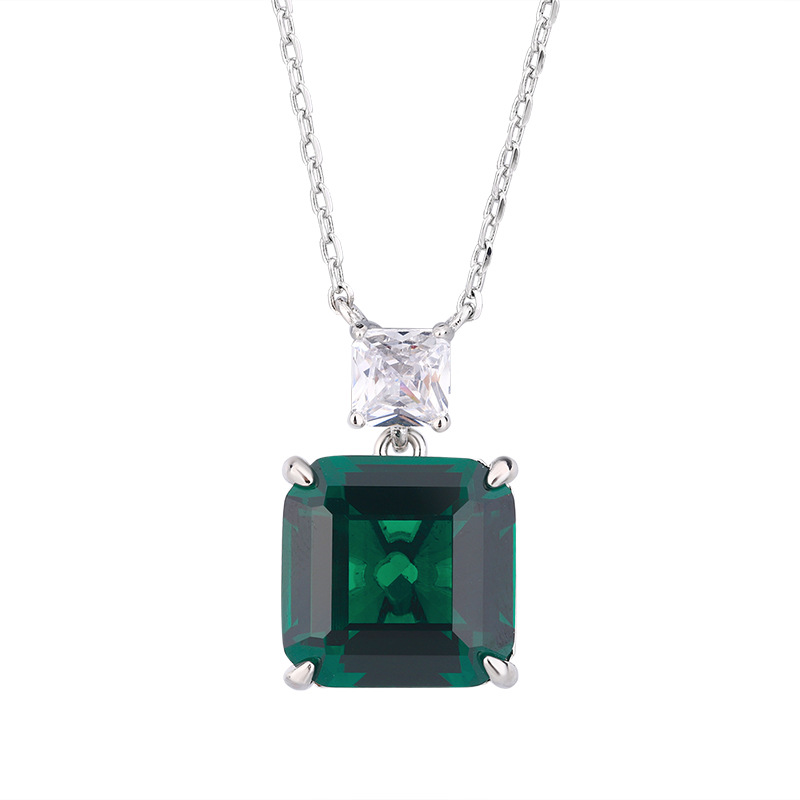 Zhuang Sheng joyería cobre inferior chapado en oro simulación paloma rojo sangre corindón verde nano nicho temperamento traje piedra principal 12*12