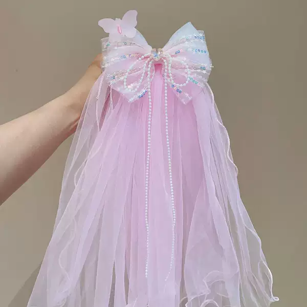 Fuchsia hairgrip pearl with bow
