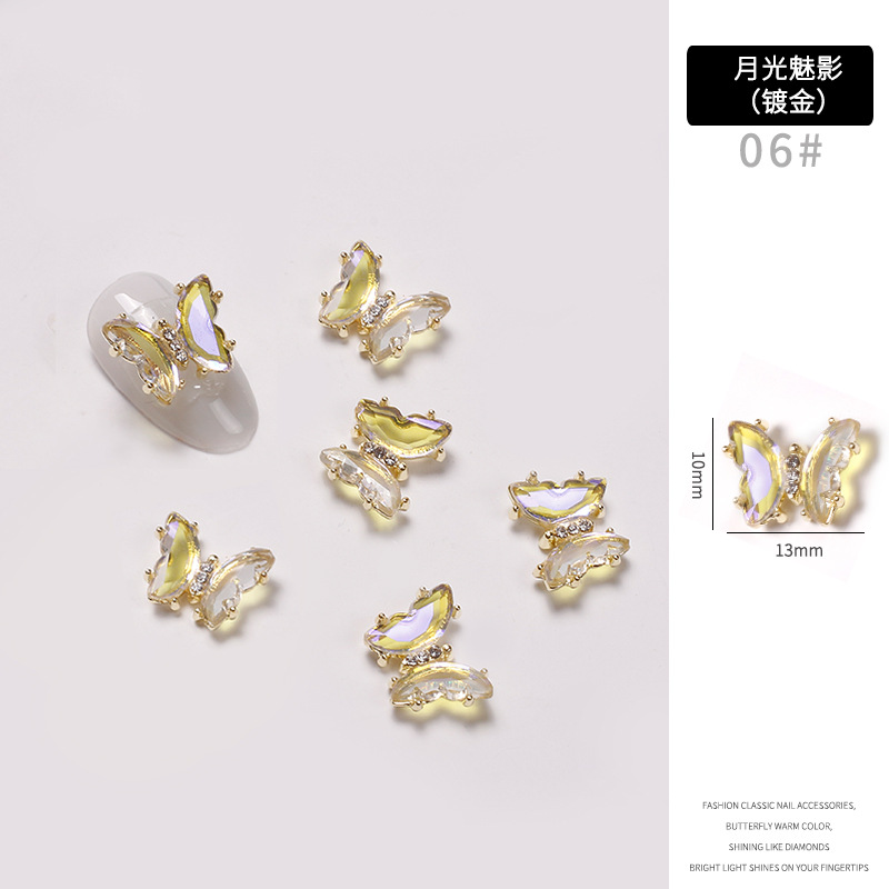 Red famosa nueva mariposa perforación joyas de manicura aleación tridimensional mariposa cristal permeación de hielo insins viento cristal mariposa perforación