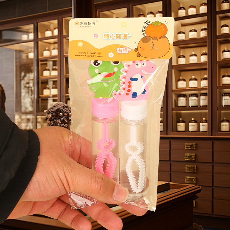 Barras de burbuja de dibujos animados de sonido pequeño juguete de burbuja de mano para niños y niñas regalos de vacaciones al por mayor