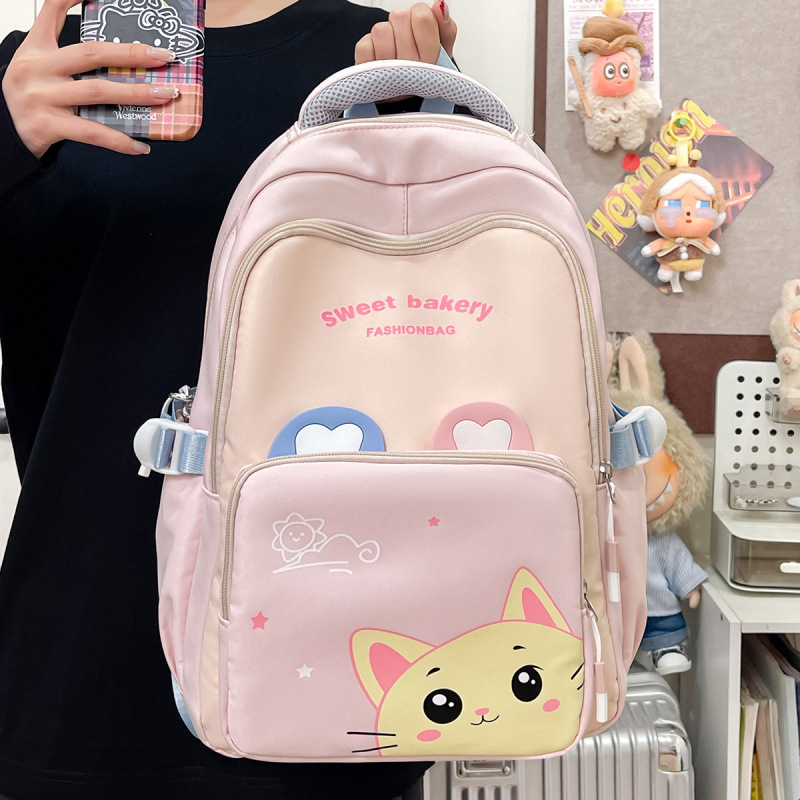 New cute backpacks for boys and girls, lightweight and versatile, suitable for elementary school students in grades 3-6, large capacity, cross-border e-commerce.