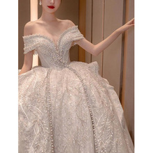 一字肩法式婚纱2024新款新娘重工奢华高级质感拖尾白色主纱宫廷风