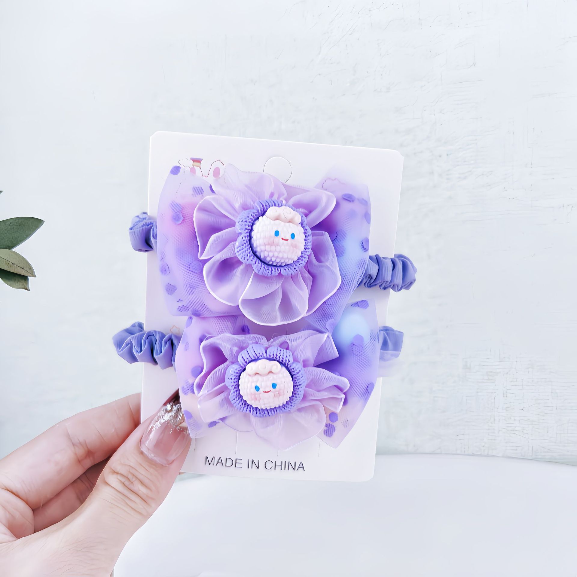 2 flores púrpura