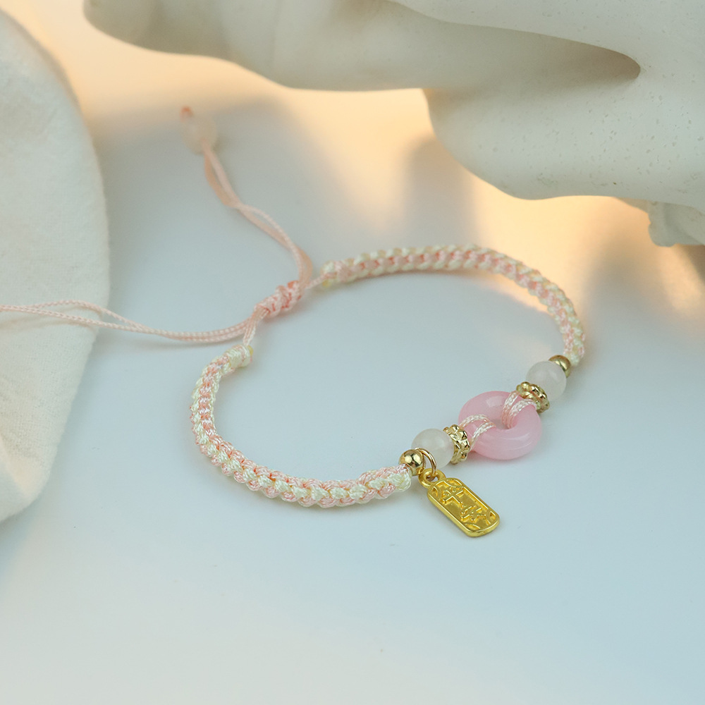 2025 nuevo amigas joyería de mano de melocotón de seguridad pulsera de pareja mujer ligera de lujo nicho tejido de mano
