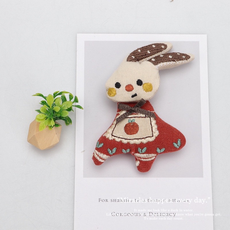 韓国の新しい布芸は綿の漫画の熊の大きいガチョウのエプロンのウサギのブローチの部品の服装のアクセサリの靴の帽子の部品を詰めます。|undefined