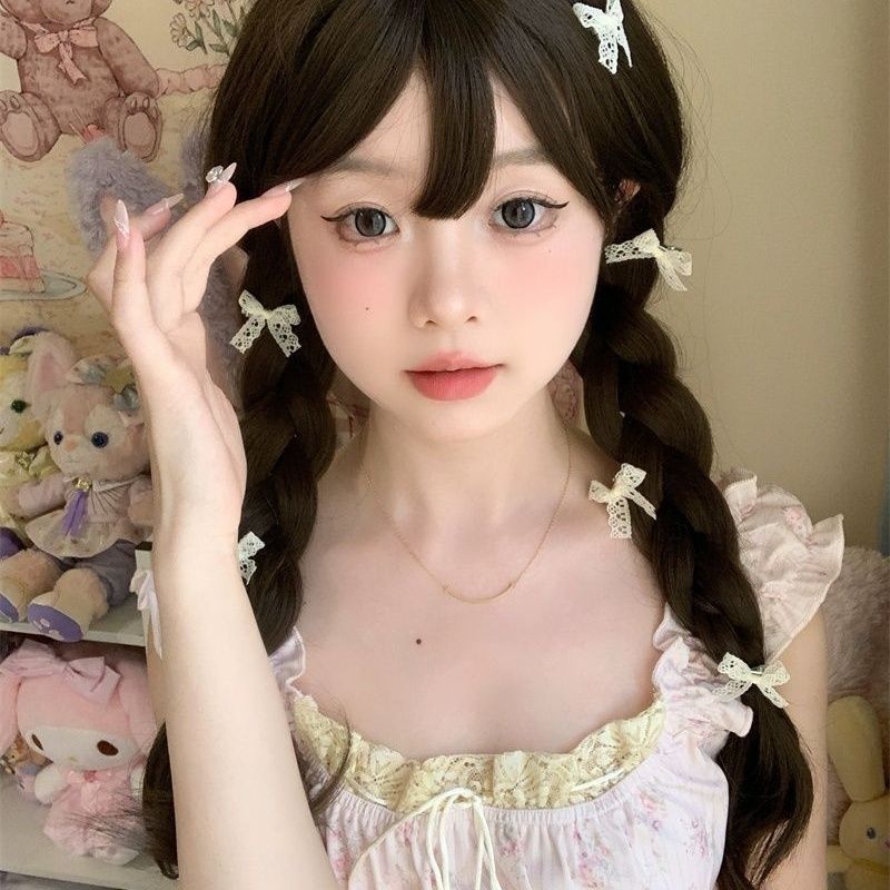 Beige cute small hairgrip with bow