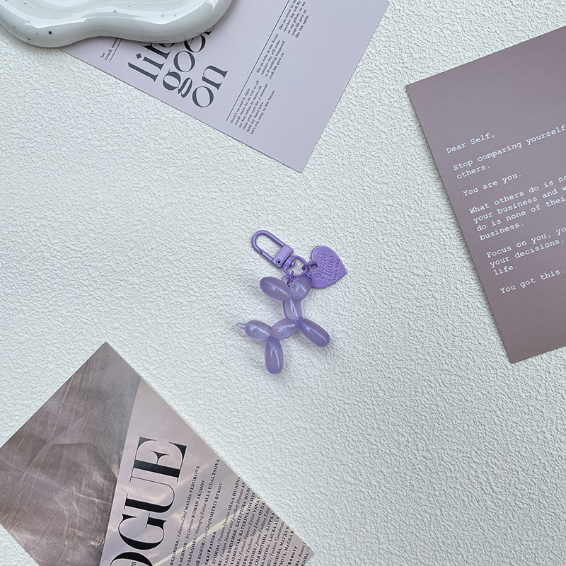 Pequeño Libro Rojo mismo lindo jalea globo láser perro llavero colgante colorido cachorro de dibujos animados teléfono llavero