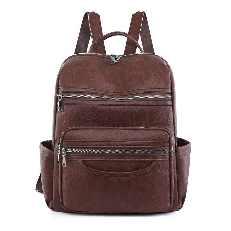 Mochila transfronteriza para mujer 2024 nuevo estilo de cuero suave de gran capacidad mochila de computadora retro de color sólido mochila escolar de moda