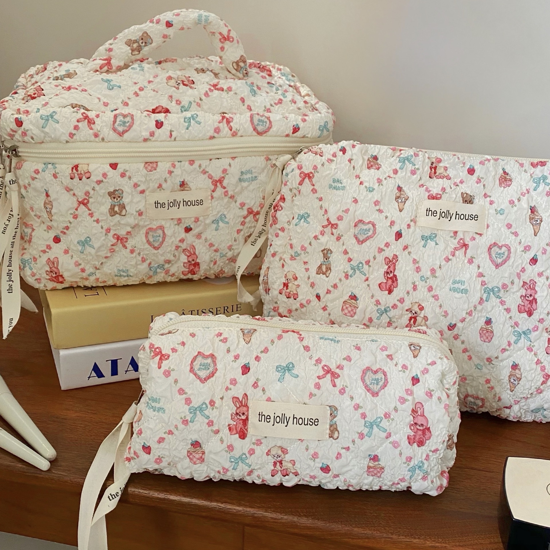 Versión coreana de la bolsa de cosméticos con lazo simple, bolsa de lavado de viaje portátil de gran capacidad, bolsa de almacenamiento de cosméticos para niñas