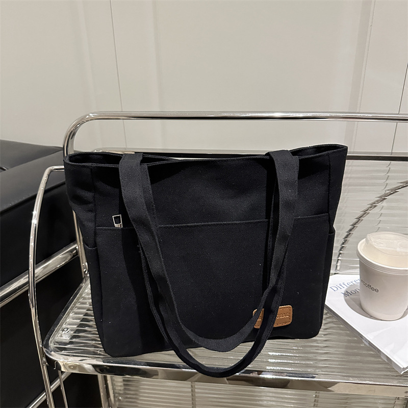 Bolsa de lona de alta capacidad para mujeres japonesas simple versátil bolso de hombro de viaje de estudiantes bolso especial