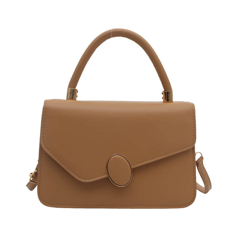 2025 primavera nuevo estilo simple y popular bolso de hombro coreano de color sólido simple bolso de literatura y arte para mujeres