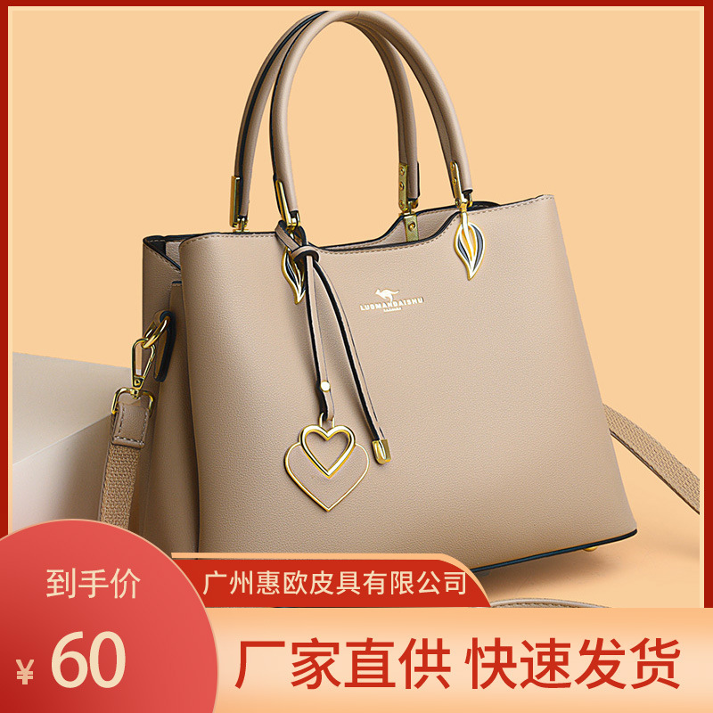2023 new women's large-capacity practical foreign-style wedding bag to send mother a generation of three-layer soft leather messenger bag