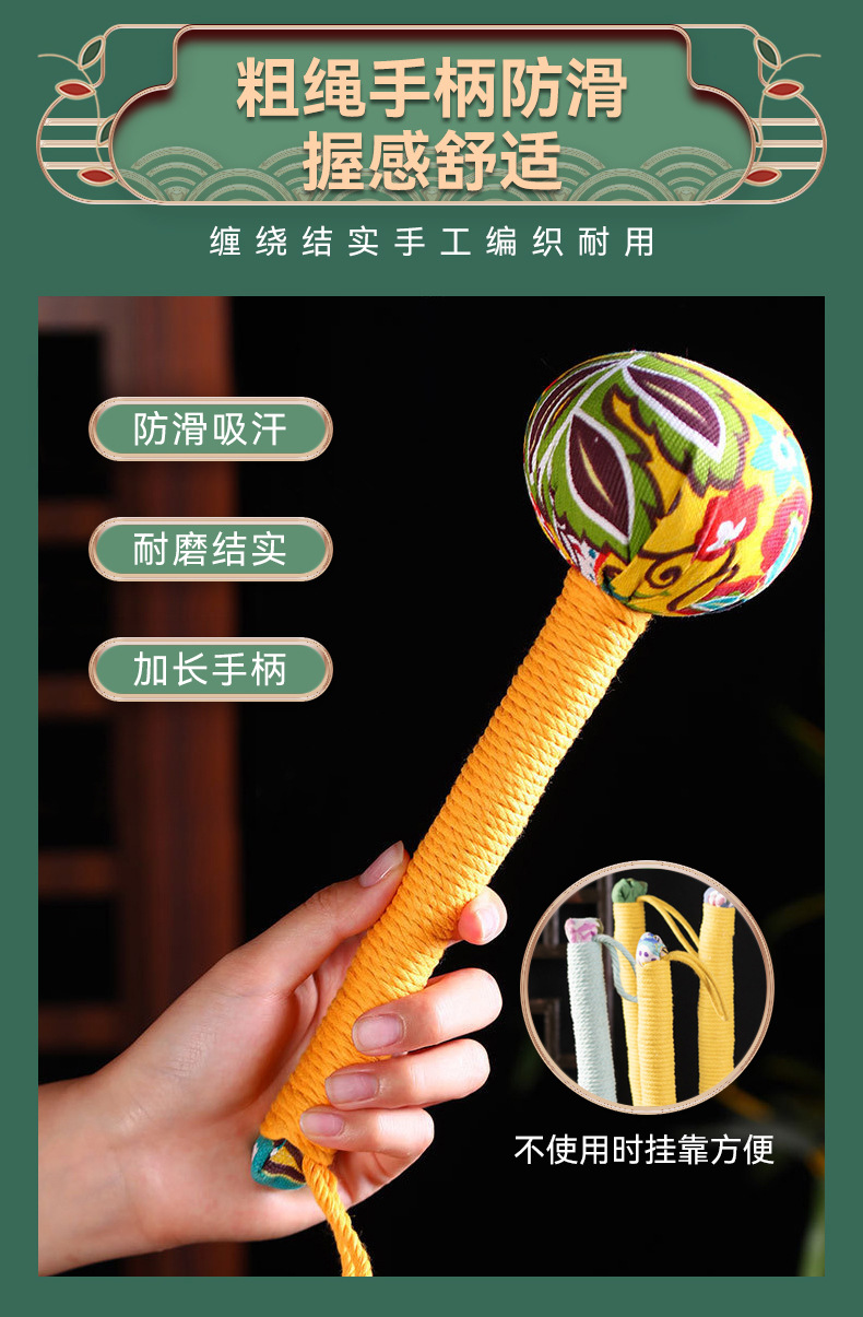Handmade Mugwort Herbal Massage Hammer 26cm Portable Body Tapping Tool with Ai Cao Filling in use