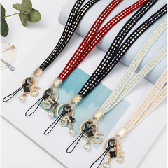 Xiaoxiangfeng mobile phone lanyard hanging neck for women without strangulation pearl 5-word four-leaf clover mobile phone chain long sling wholesale