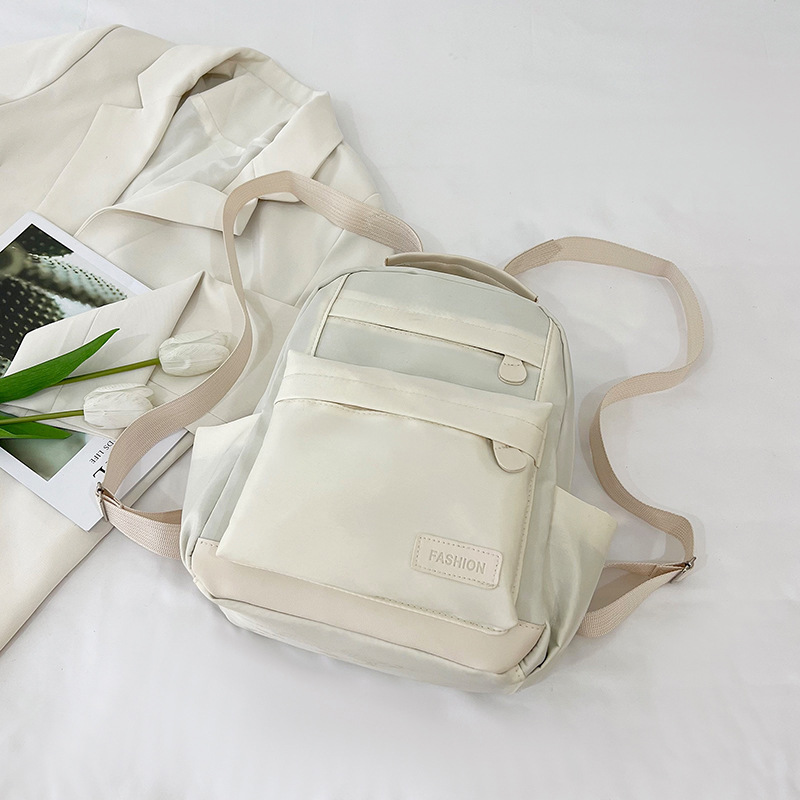 2025 primavera nueva mochila simple de color sólido mochila de estudiantes de escuela primaria mochila de viaje al aire libre