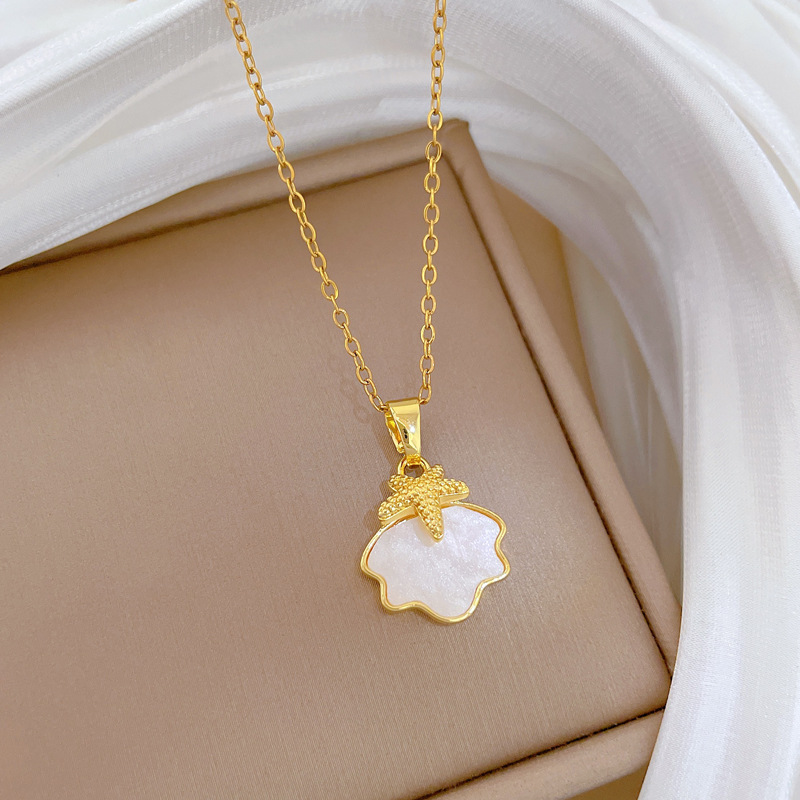 Colar de concha estrela do mar em aço titânio para mulher_voghion.com