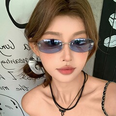 ネットの赤い同モデルの高級感の縁のないサングラスの女性のすっぴんの百合の日焼け止めのサングラスの新型の街は潮のサングラスを撮影します。