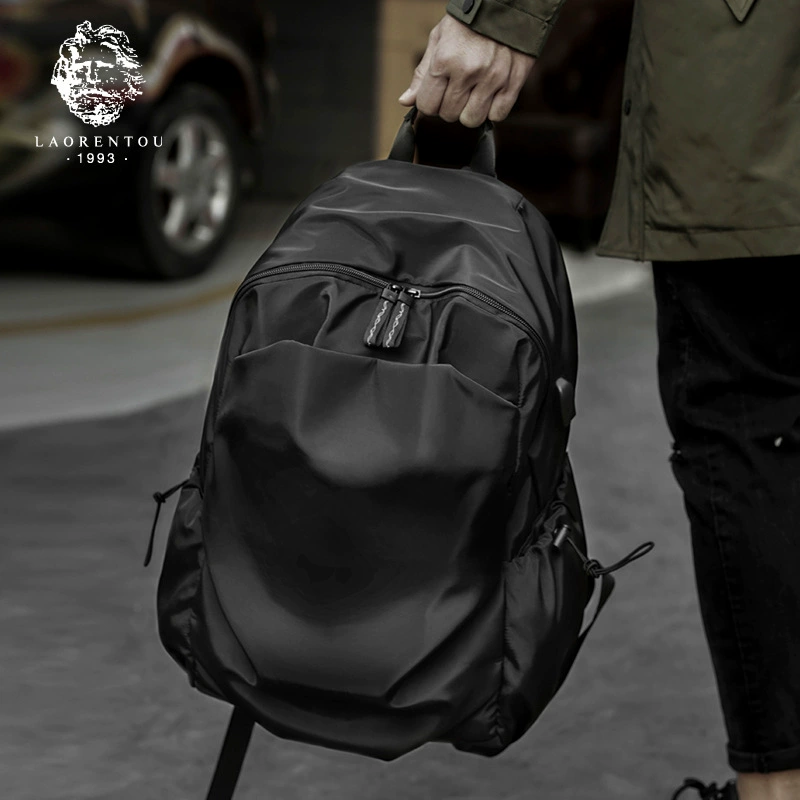 Новый мужской рюкзак, большой вместимости, легкий, женский повседневный рюкзак, простой рюкзак в японском и корейском стиле, высококачественный, практичный и легкий.