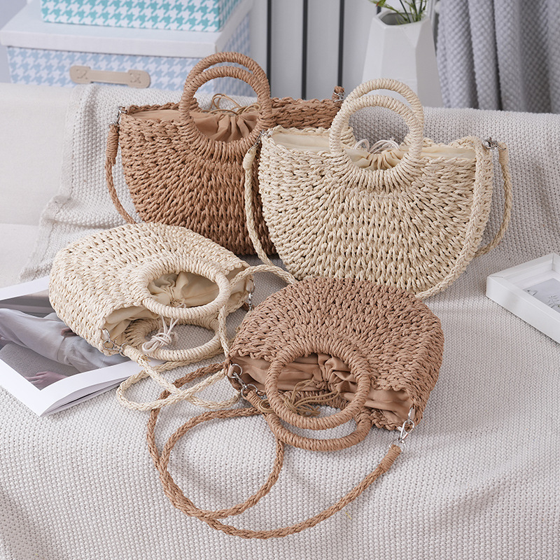 夏季新款元宝形圆斗包手工编织纯色草编包简约日常搭配女士手拎包