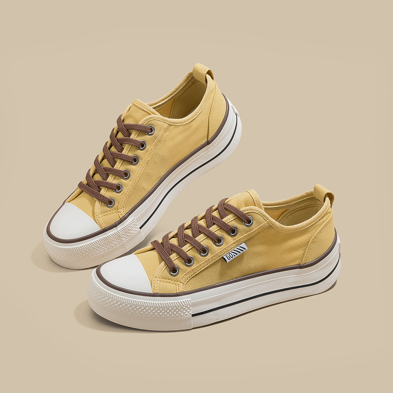2026 nuevo estilo de moda zapatos de lona de altura de suela gruesa para mujeres zapatos de moda retro más estudiantes zapatos de lona casuales universales
