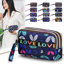 包包厂家批发地摊货源卡通三层拉链手拿包新款印花休闲时尚零钱包