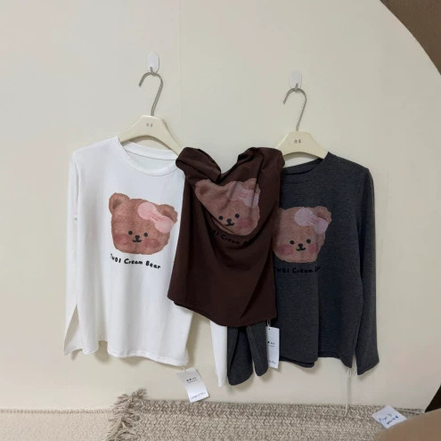 2026 new plus-size women's autumn collection: versatile, trendy long-sleeved T-shirt with a cute cartoon bear print for a youthful look 2026 new plus-size women's autumn collection: versatile, trendy long-sleeved T-shirt with a cute cartoon bear print for a youthful look