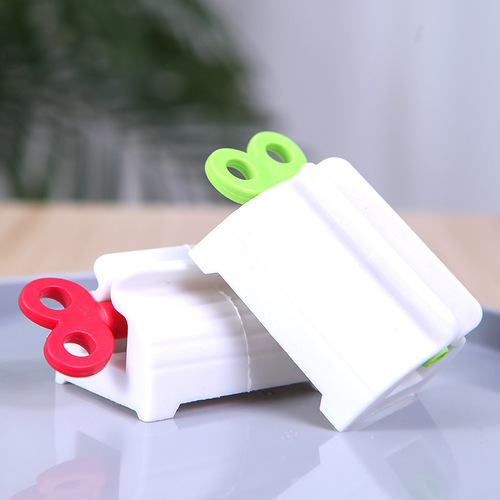 T manufacturer wholesale manual toothpaste squeezer lazy facial cleanser squeezer manual rotating toothpaste squeezer