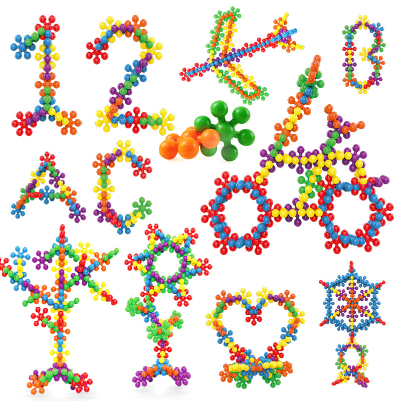 Transfronterizo 3D tridimensional giratoria Plum Blossom Building Blocks Fun montaje de piezas de copo de nieve montaje Iluminación educación temprana juguetes educativos