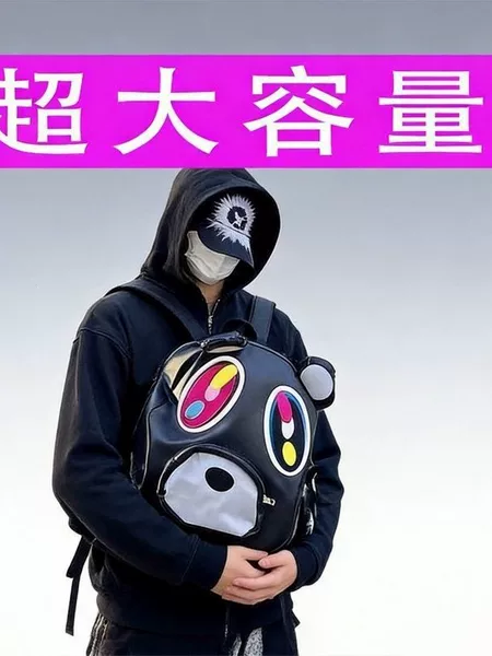 Online dating expert's original, humorous design: a large-capacity backpack featuring a bear and a black PU leather exterior, perfect for students and couples, with a cartoon design