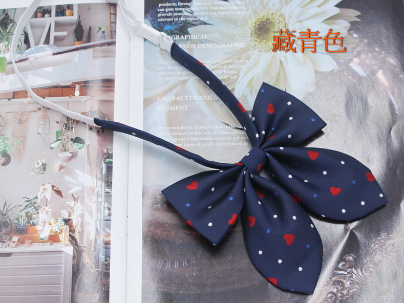 Spot al por mayor amor corbata de pajarita de oreja de conejo mujer jacquard de seda de poliéster más estilo universitario duro pajarita de pajarita flor de diez colores