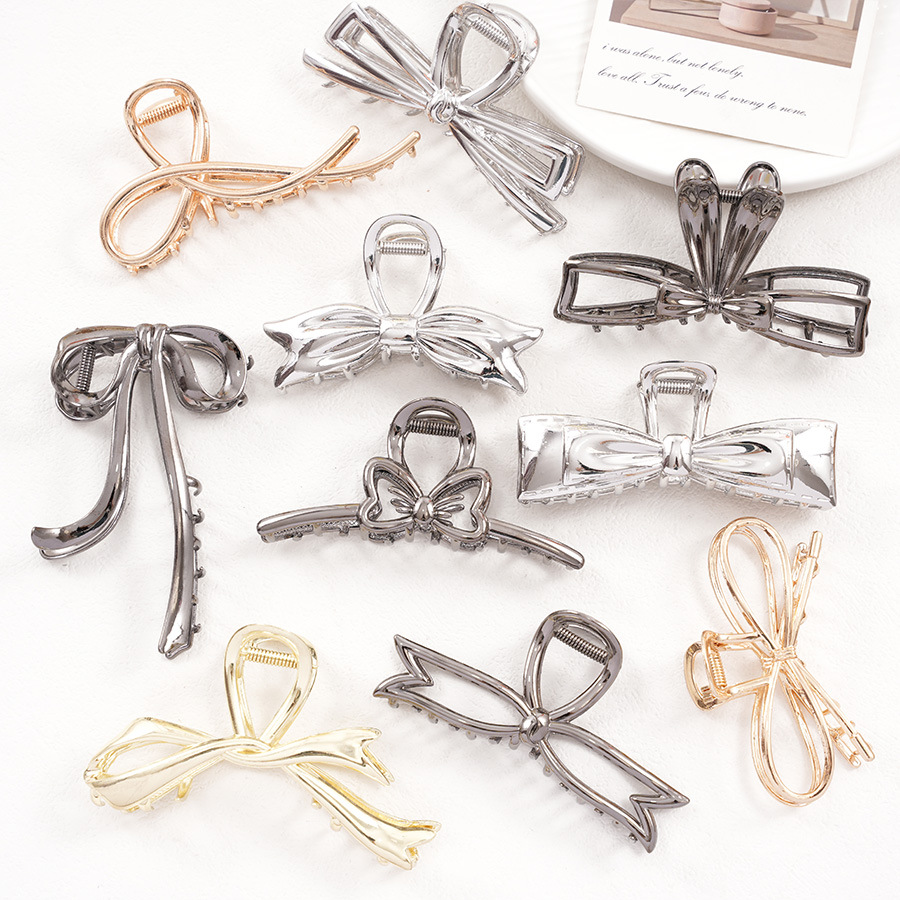 IG Style Shiny Women's Bow Knot Zinc Alloy Imitation Pearl Rhinestone Hair Claws display picture 3