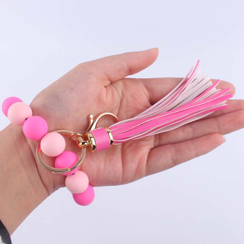 Nueva pulsera de silicona creativa muñeca llavero colgante DIY borla colgante de silicona con cuentas llavero Accesorios
