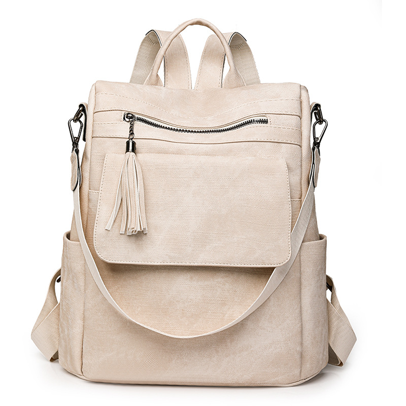 Nuevo estilo mochila mujer 2024 de gran capacidad retro moda borla bandolera viaje de ocio mochila ligera al por mayor