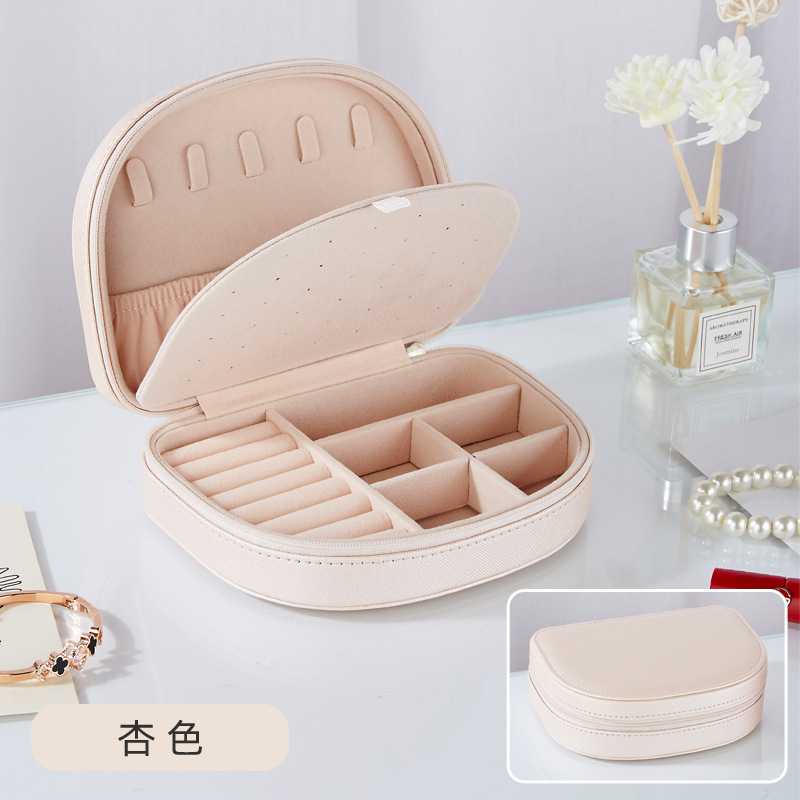 Caja de joyería de venta caliente transfronteriza pequeña semicírculo en forma de concha pendientes anillo collar joyería caja de almacenamiento de cuero para mujeres