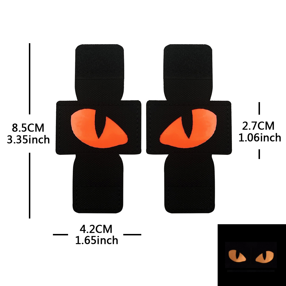 Creativo suministro personalizado gato ojo luminoso moral sello al aire libre militar fan mochila sello pequeño diablo militar MOLLE colgante