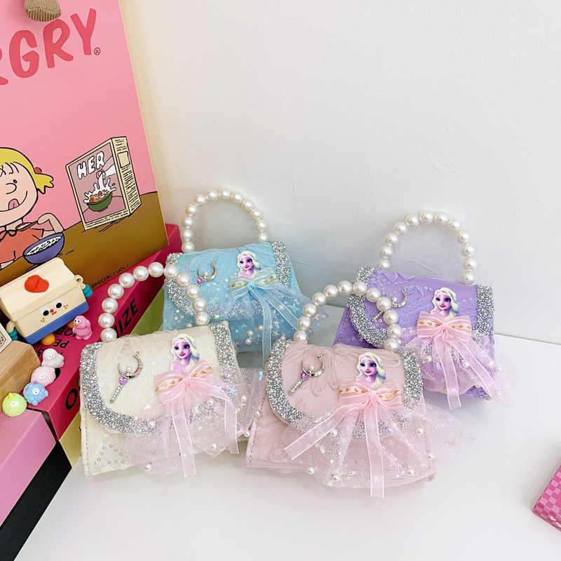 Nuevo bolso de moda para niños bolso de perla animado lindo arco de botón bolso de hombro de niñas cadena diagonal bolso pequeño