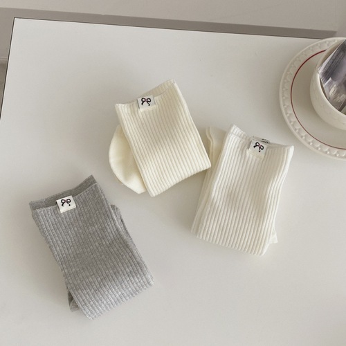 New Korean bow cloth label double needle socks for women's mid-long tube pile socks Korean simple calf socks white