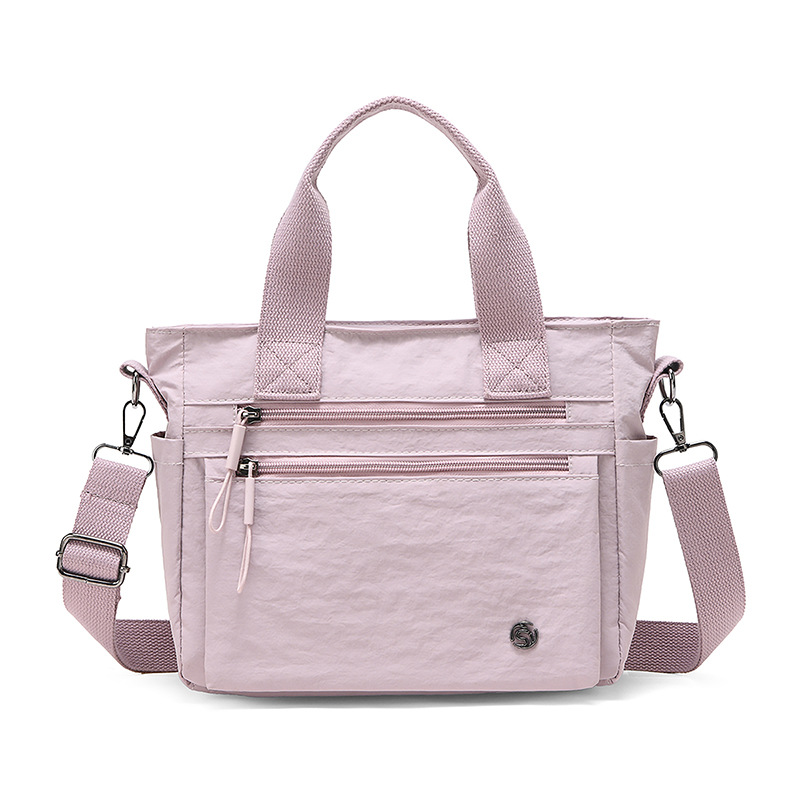 Bolsa de hombro de tela de nylon casual diaria para mujeres 2025 invierno nuevo paquete de transporte impermeable de gran capacidad