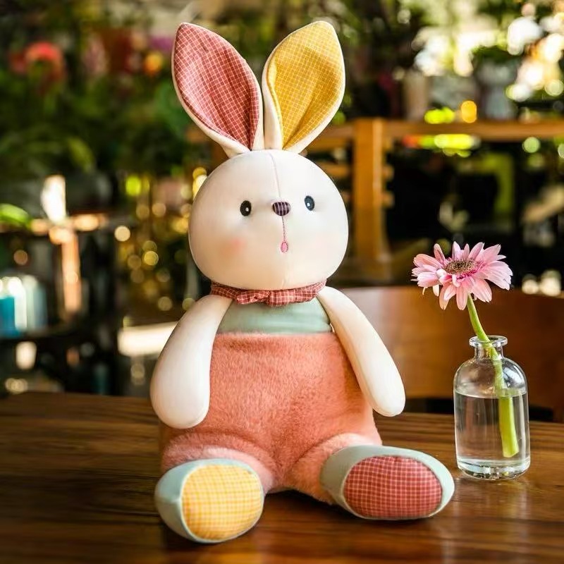 Peluche de 25 cm para máquina de agarre, muñeco suave ideal para regalos o eventos.