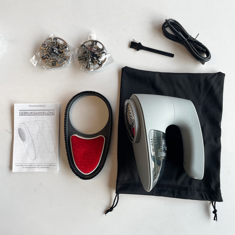 Recortador de bolas de lana, afeitadora de tela de Amazon transfronteriza, afeitadora de felpa, cargador, enchufe, extractor de bolas de doble propósito, exportación