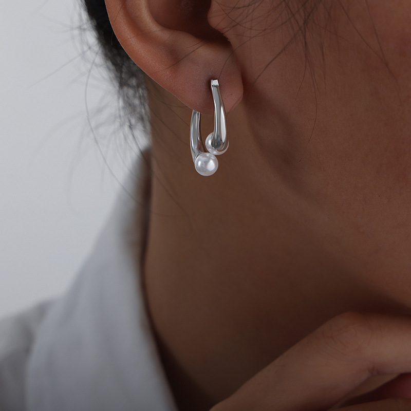 Personalizada elegante nicho estilo casual elegante diseño de división incrustaciones de alto brillo cuentas de concha de titanio simple de acero chapado en oro