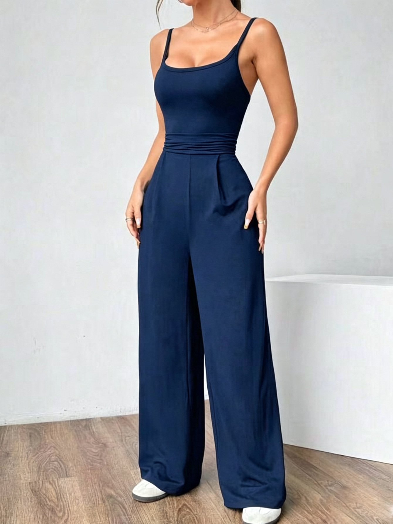 G25J090-2025 Europa y América de alta gama ropa de mujer de color sólido de moda micropantalones largos con colchón de espalda descubierta monje casual para mujeres