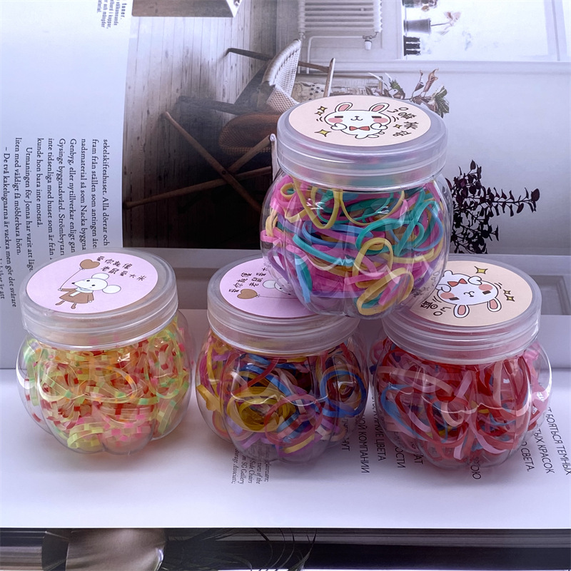 Barrel de calabaza de dibujos animados desechables banda de pelo de los niños banda de goma supermercado tienda física dos yuanes tienda de accesorios de cabeza