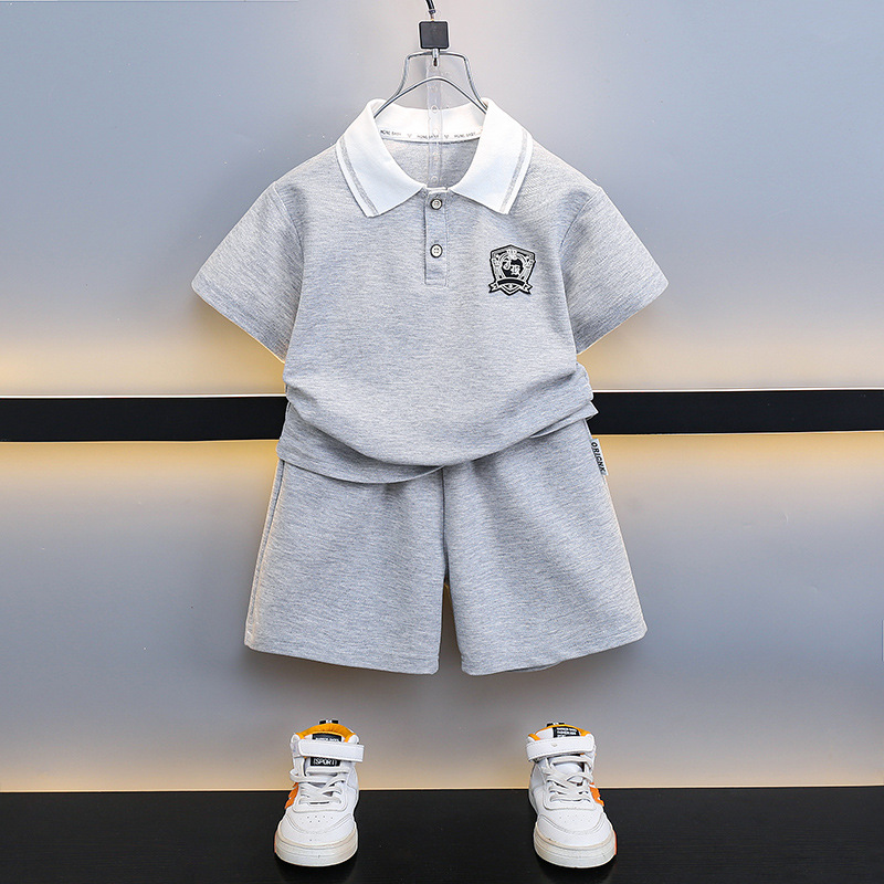 7198 ropa de verano para niños 2025 nuevo traje ropa para niños bebé verano camisa POLO manga corta para niños manga raglán marea