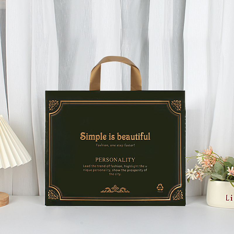 Tienda de ropa de suministro de fábrica bolso transparente logotipo impreso bolsa de embalaje de regalo bolsa de plástico de embalaje de ropa al por mayor